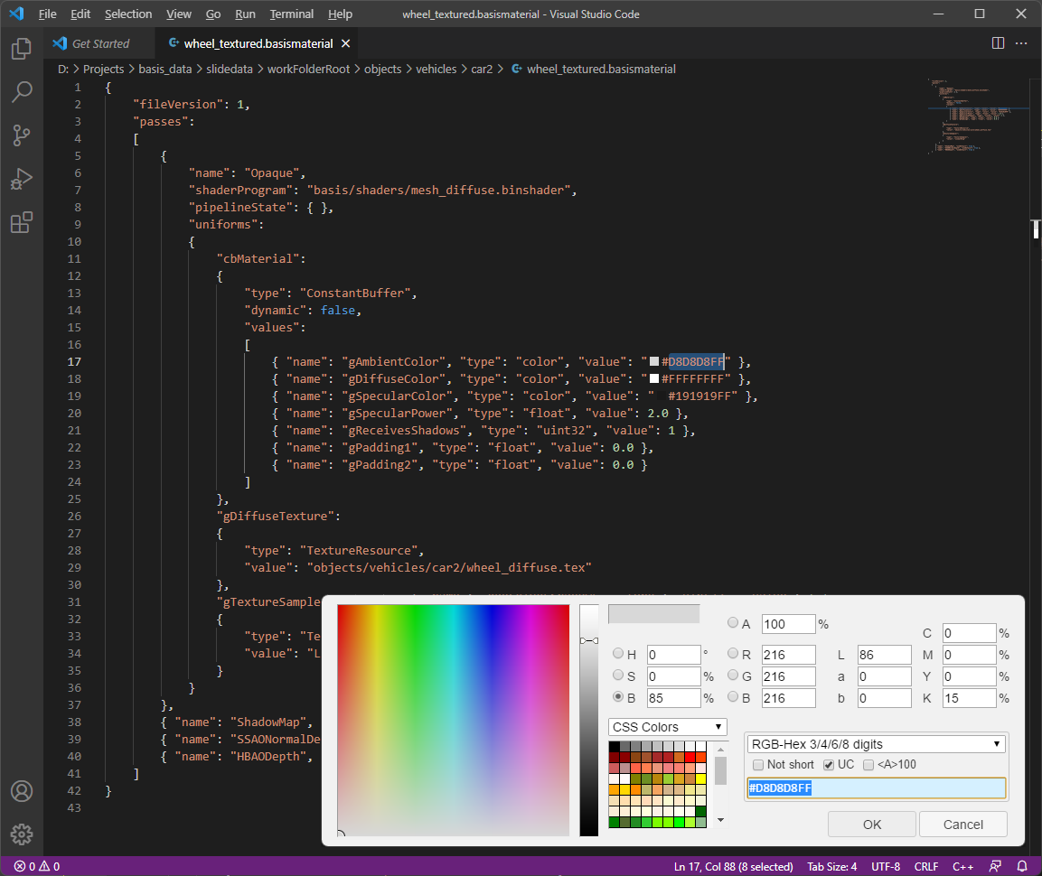 Editing a material for a car wheel in Visual Studio Code.